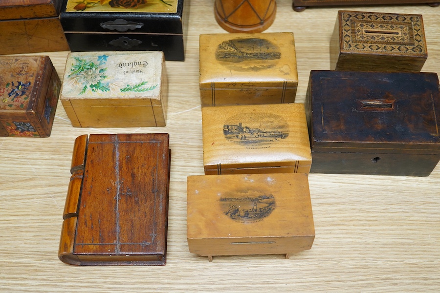 A 19th century Tunbridgeware tea caddy, 20cm wide, 11cm high, a Coquilla nut miniature money box and a collection of mixed decorative and novelty wooden money boxes (17). Condition - poor to fair